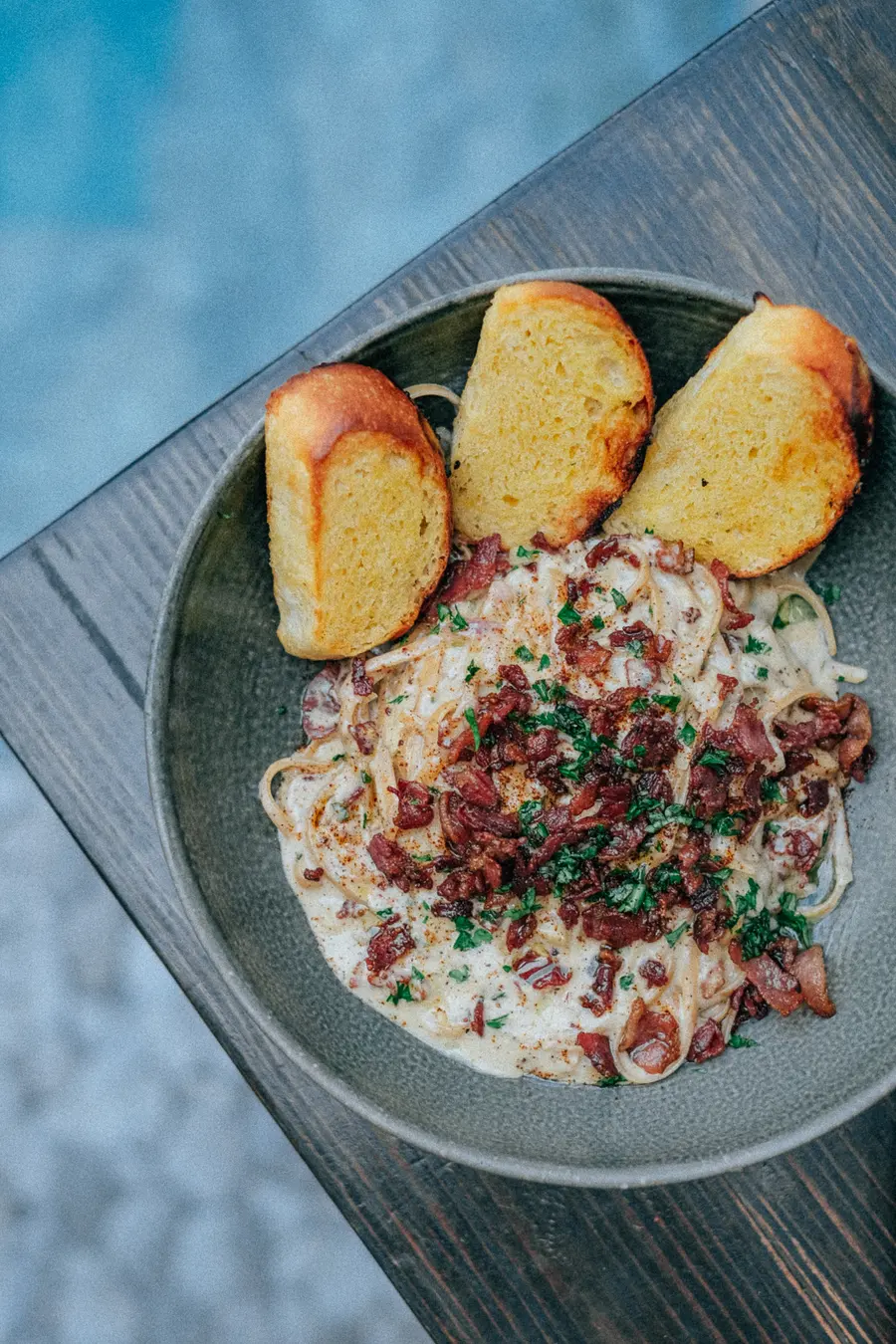 Carbonara with garlic bread at Siargao Bed & Brewery